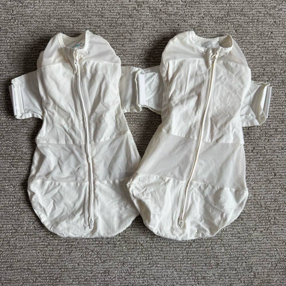 Two small Snoo swaddles